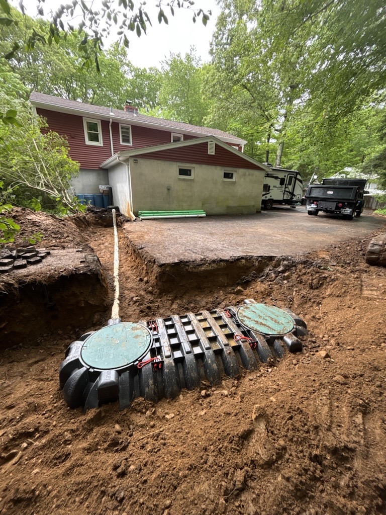 Advanced septic treatment system installed in excavation trench