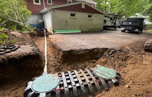 Advanced septic treatment system installed in excavation trench